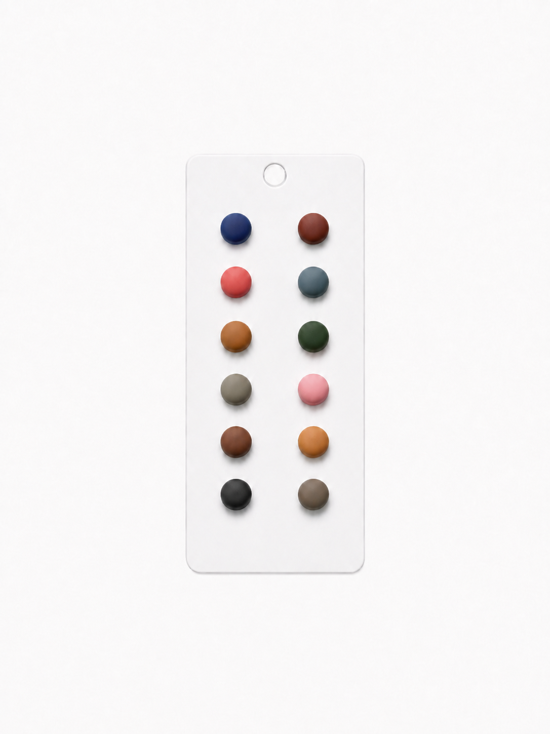 Set of 12 round hijab magnet pairs in earthy colours on a white background