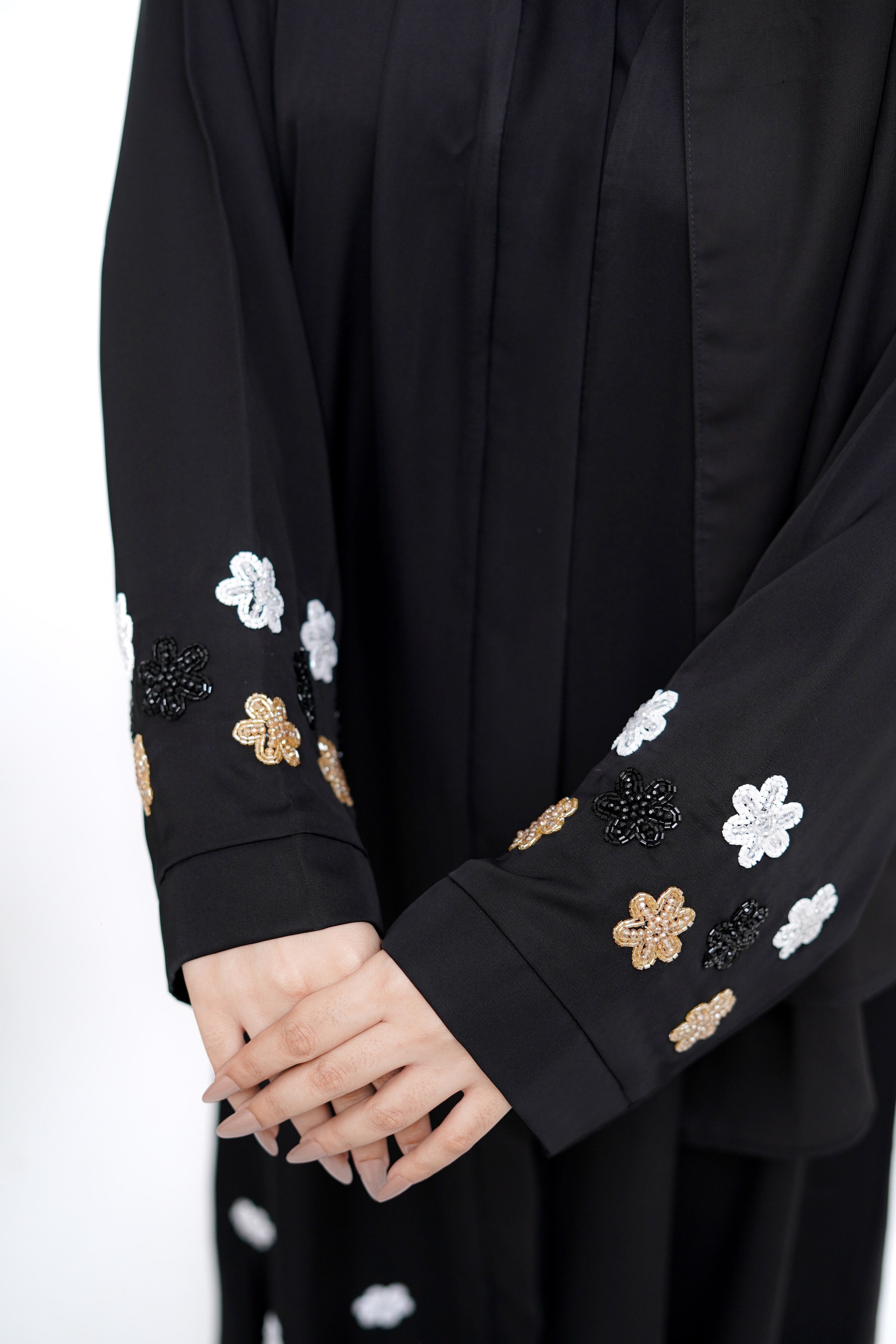 Best Black Abaya by Clarity Glam with detailed white gold and black flower embroidery on sleeves