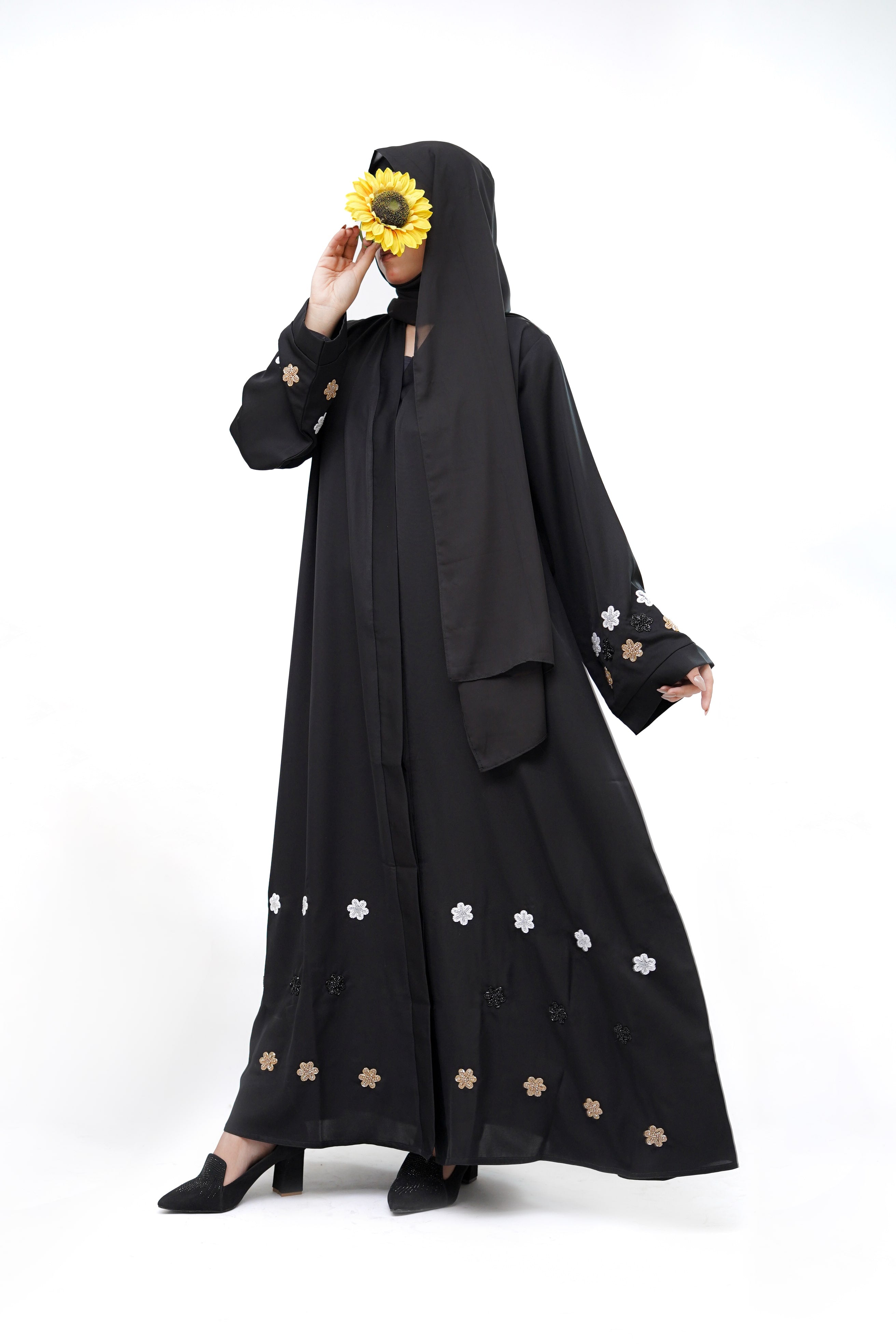 Clarity Glam elegant best black abaya with floral embroidery on sleeves and hem, styled with black heels