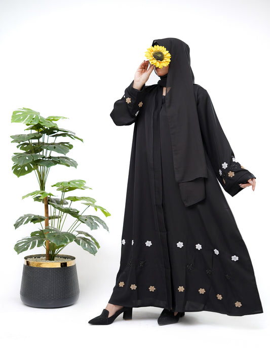 Clarity Glam best black abaya with floral embroidery on sleeves and hem worn with black heels
