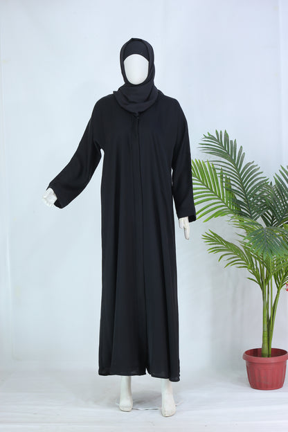Clarity Glam black abaya with matching scarf displayed on mannequin with long sleeves and flowy design