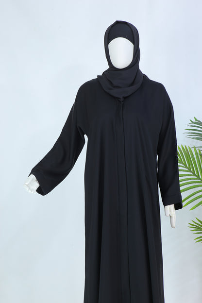 Clarity Glam black abaya with matching scarf displayed on mannequin with full sleeves and loose fit
