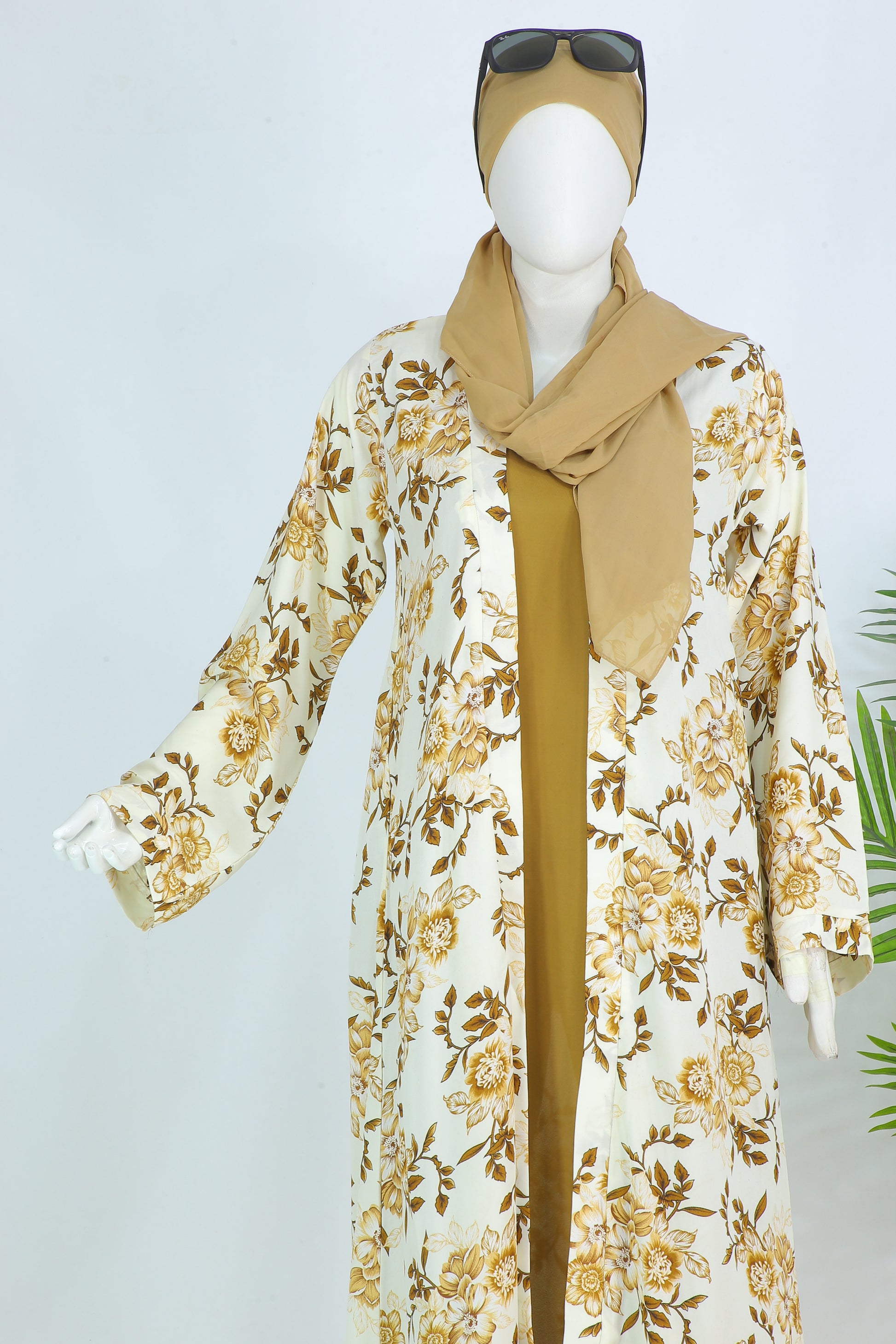 Farah Panel abaya by Clarity Glam featuring a floral cream and gold design with matching headscarf and sunglasses