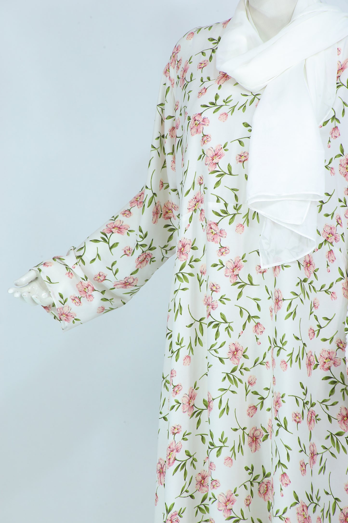 Clarity Glam white floral abaya with scarf featuring pink flower patterns and green leaves