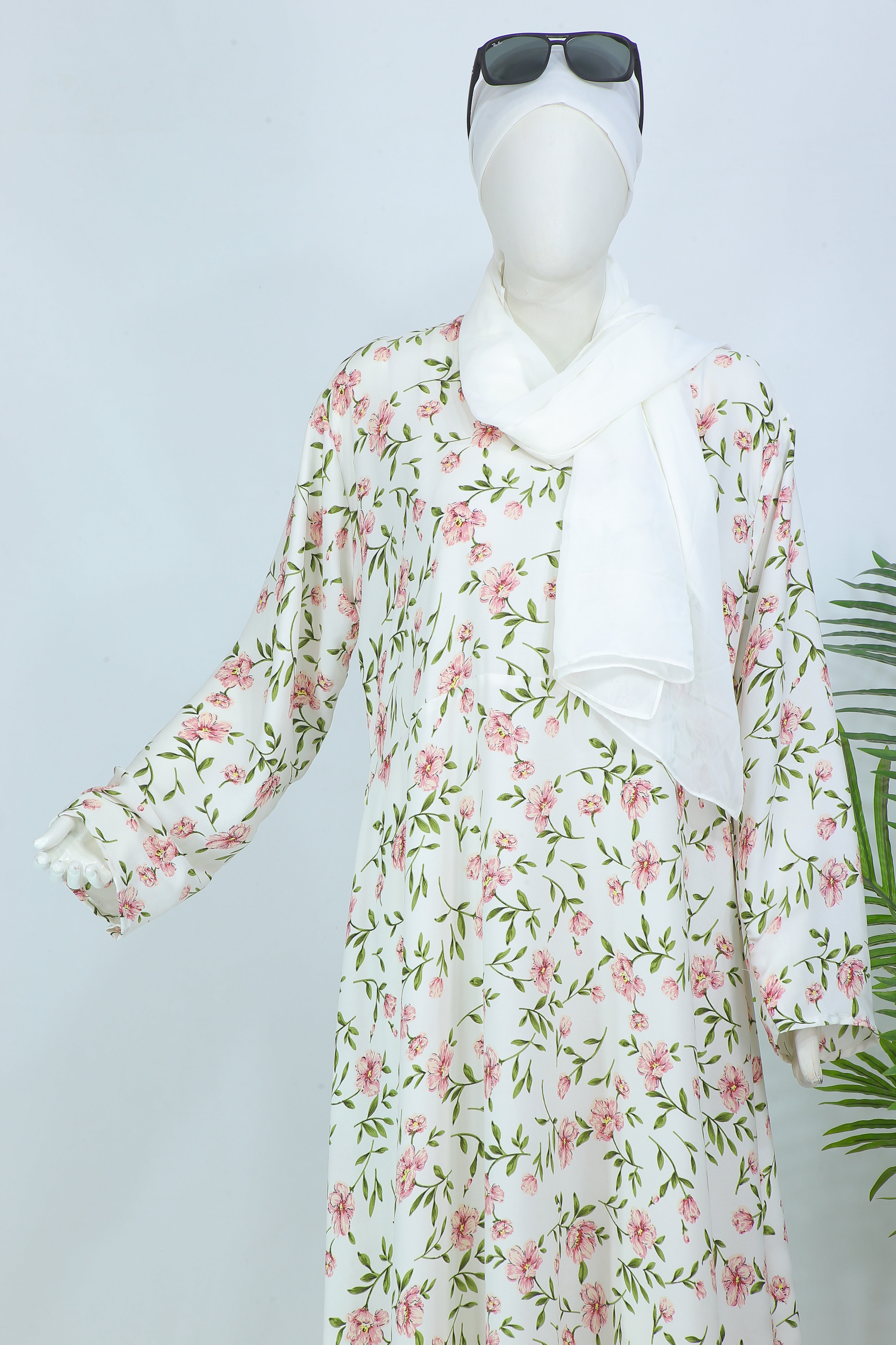 Clarity Glam floral abaya with scarf in white featuring pink flower print and green leaves