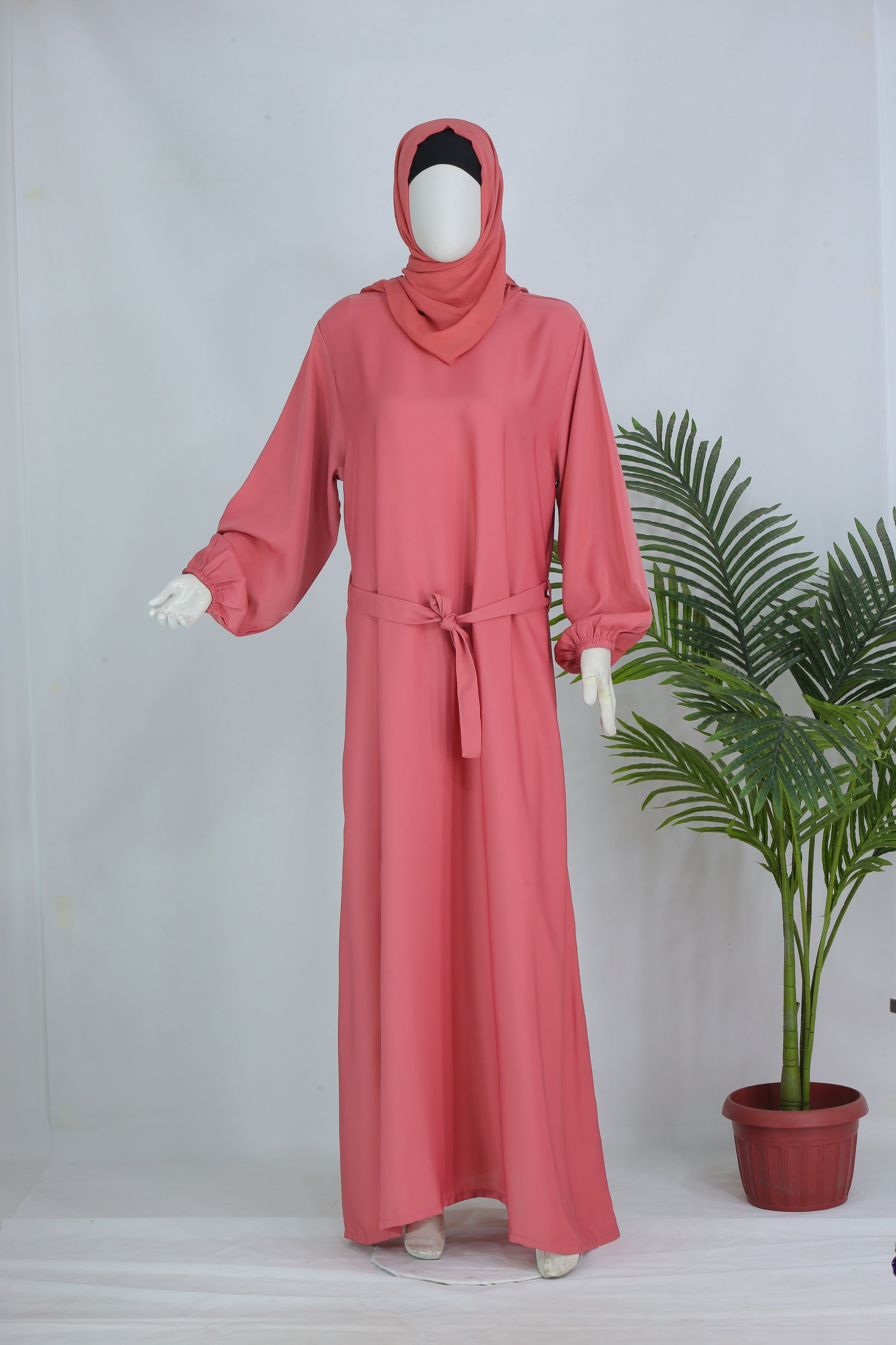 Clarity Glam luxury abaya with matching scarf in pink featuring long sleeves and waist tie