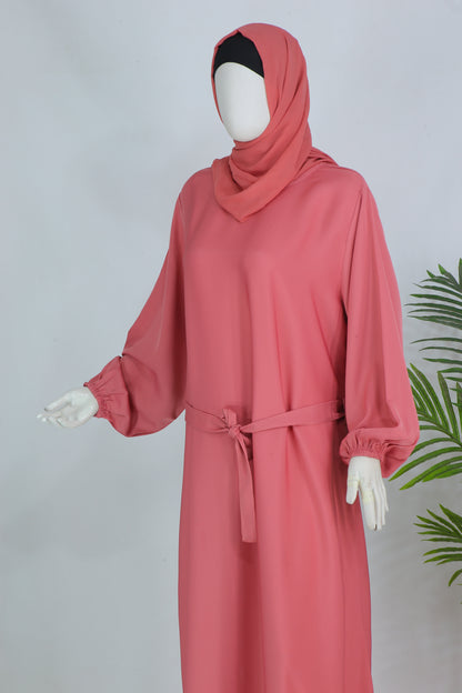 Clarity Glam luxury abaya with matching scarf in soft pink featuring a tied waist and balloon sleeves