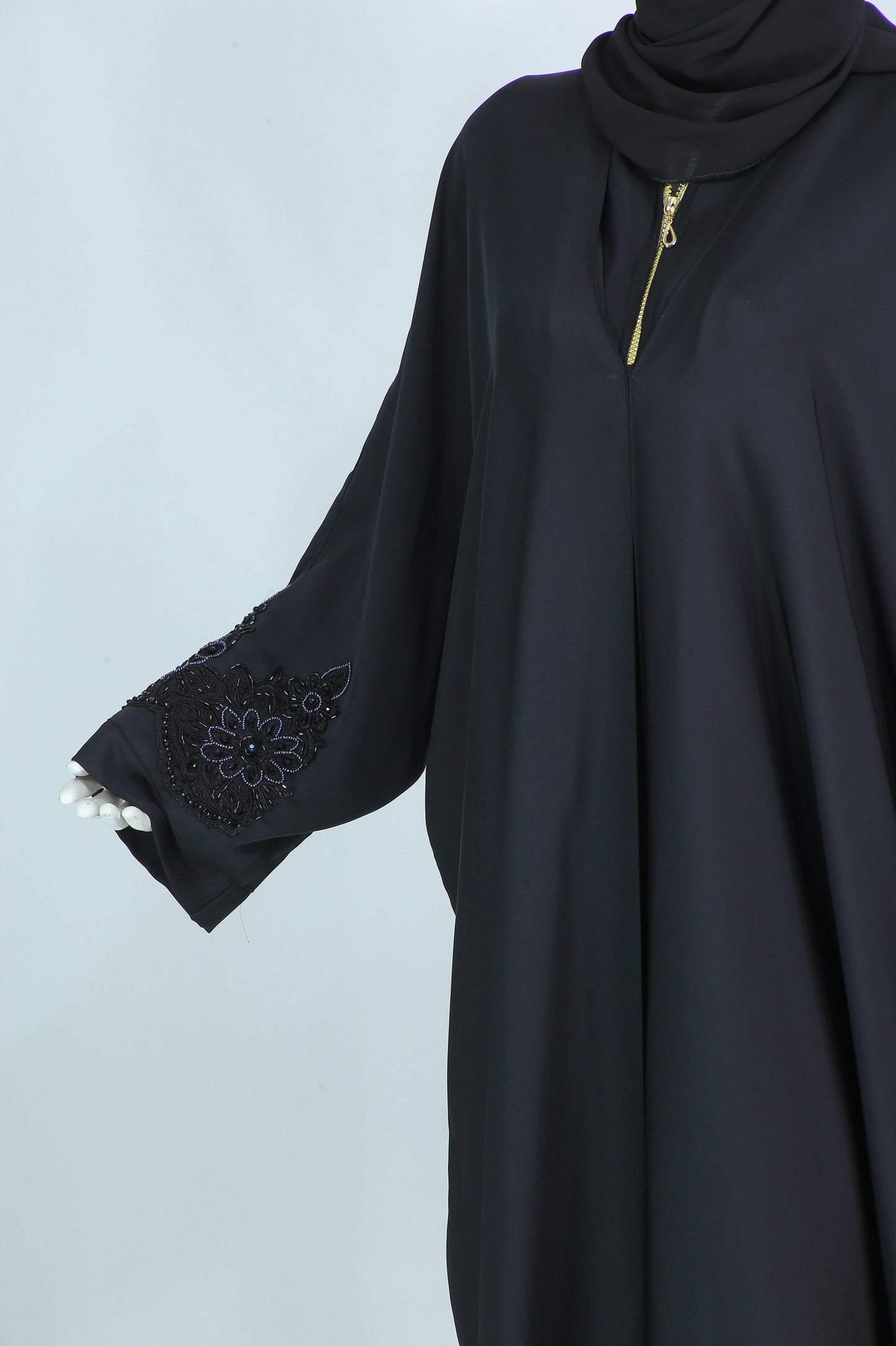 Clarity Glam luxury abaya with scarf in black featuring embroidered sleeve details and gold zipper
