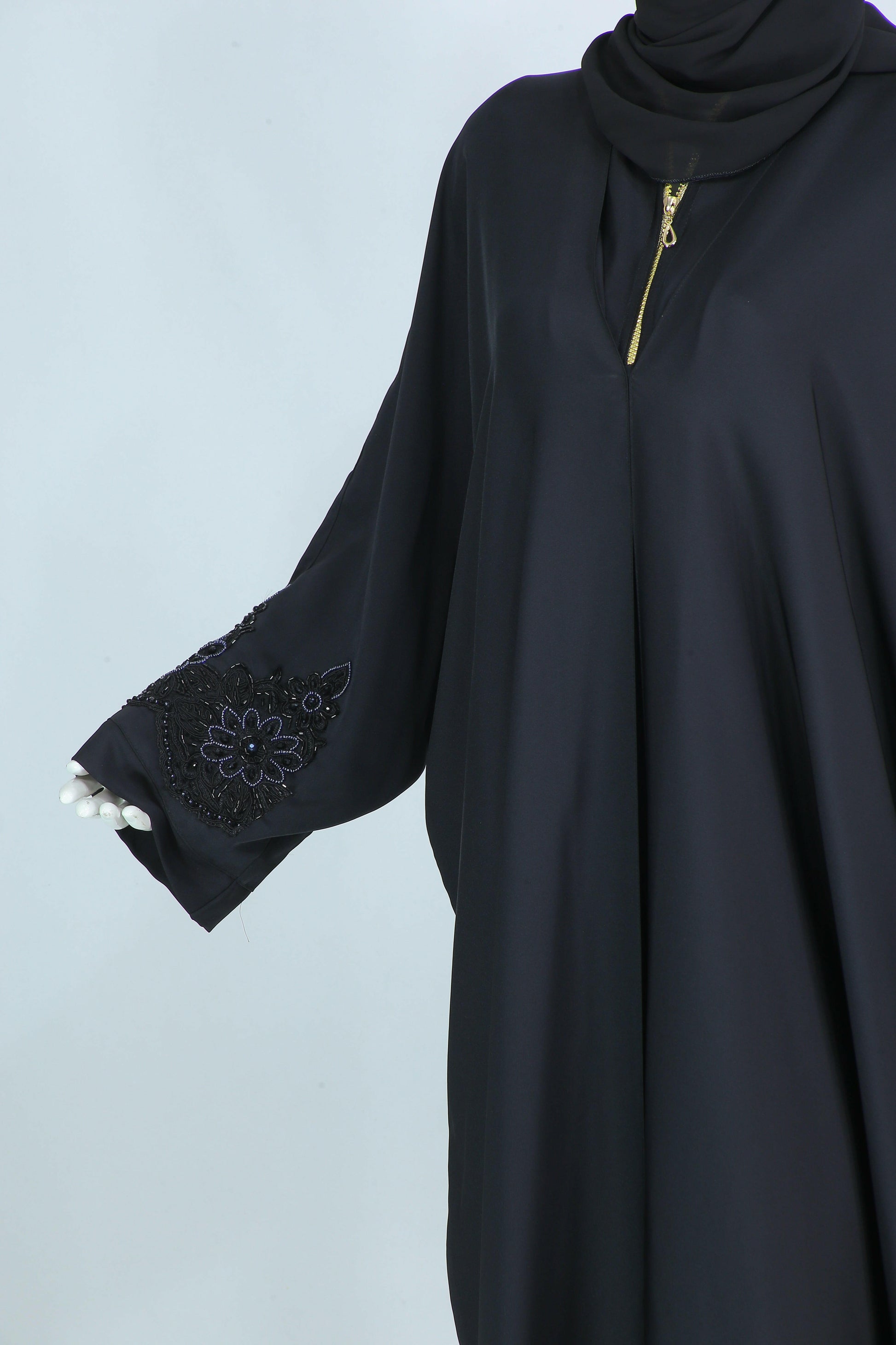 Clarity Glam luxury abaya with scarf in black featuring embroidered sleeve details and gold zipper