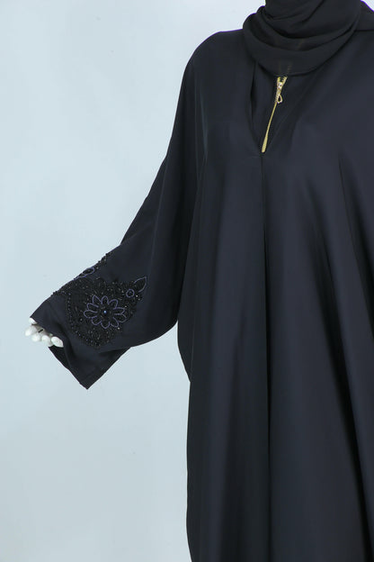 Clarity Glam luxury abaya with scarf in black featuring embroidered sleeve details and gold zipper