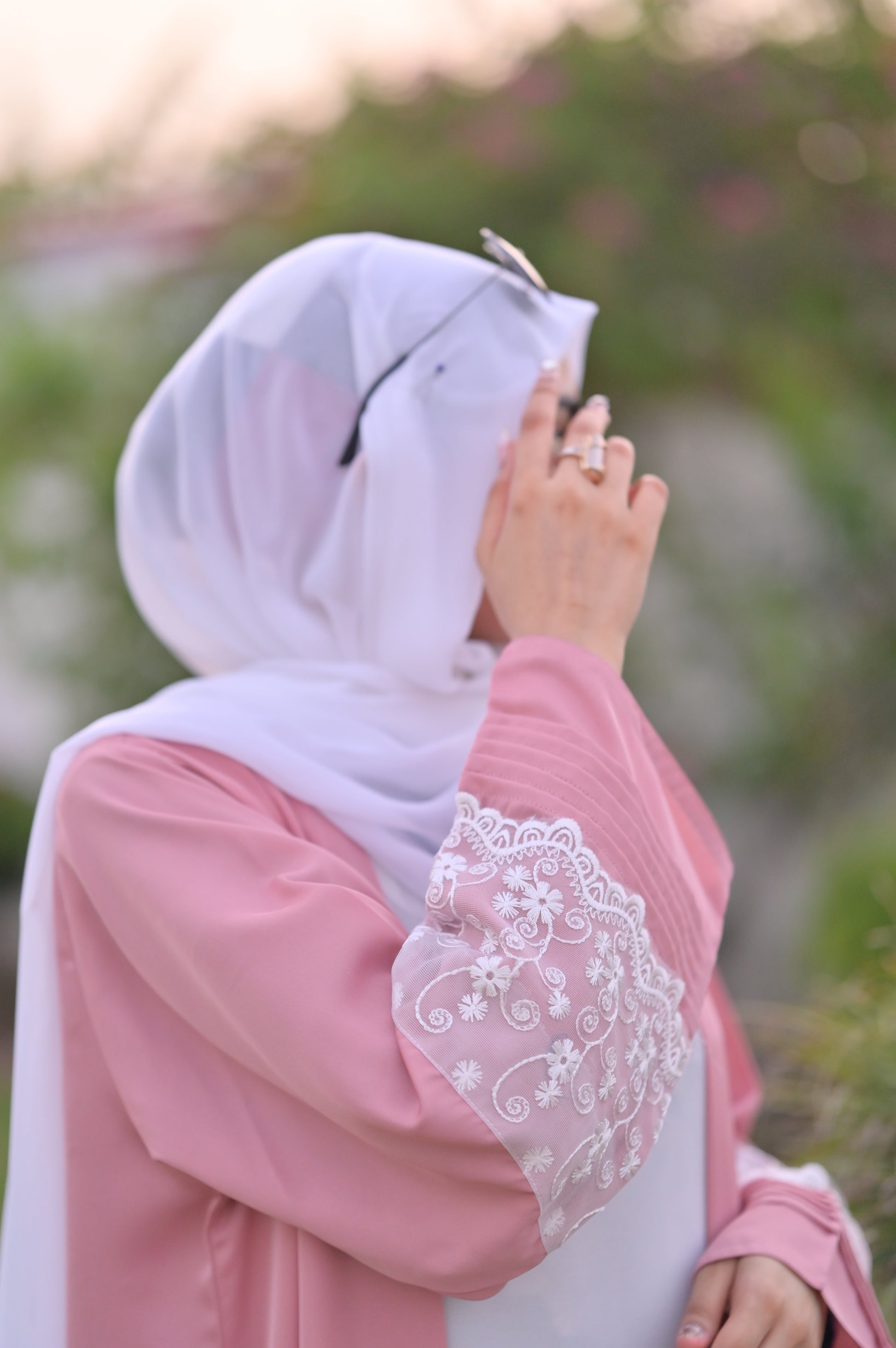 Clarity Glam luxury abaya with scarf in soft pink featuring intricate white lace embroidery on sleeve for party wear