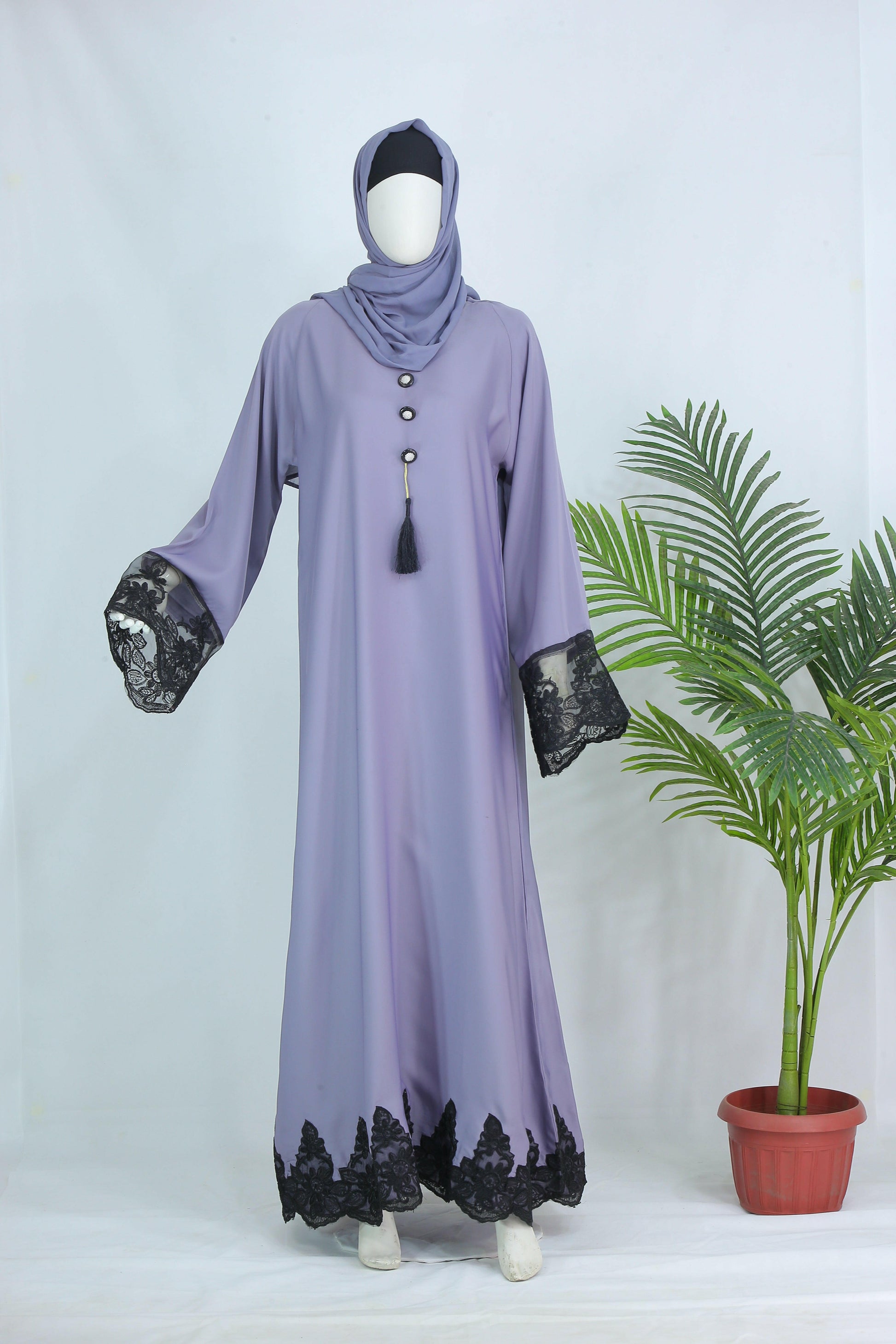 Clarity Glam luxury abaya with scarf in lavender featuring black lace details on sleeves and hem