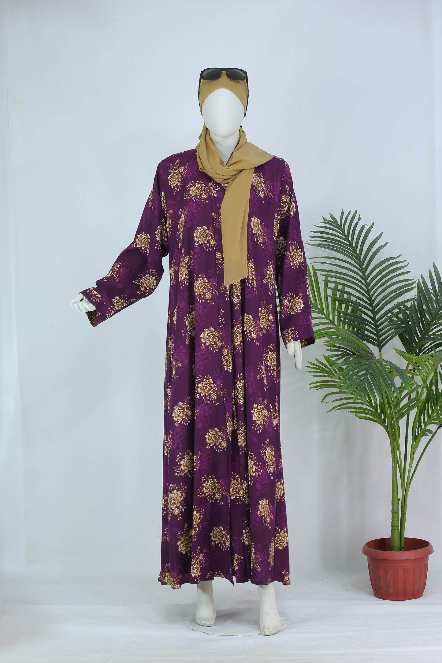 Luxury indigo abaya with scarf from Clarity Glam featuring gold floral patterns and a beige scarf