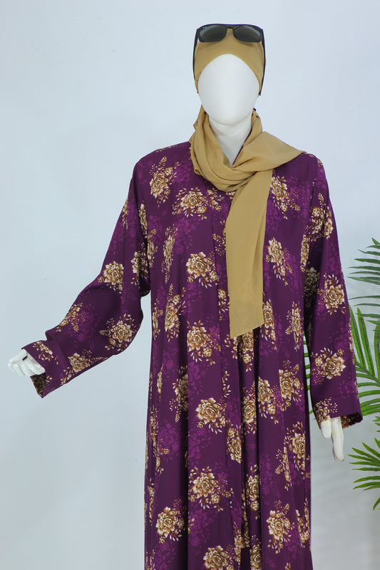 Luxury indigo abaya with scarf featuring elegant floral patterns and a mustard headscarf