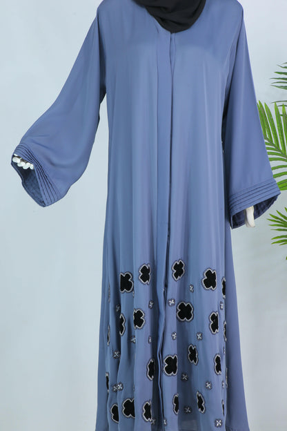 Luxury modest abaya with scarf in blue featuring black floral embroidery and wide sleeves by Clarity Glam