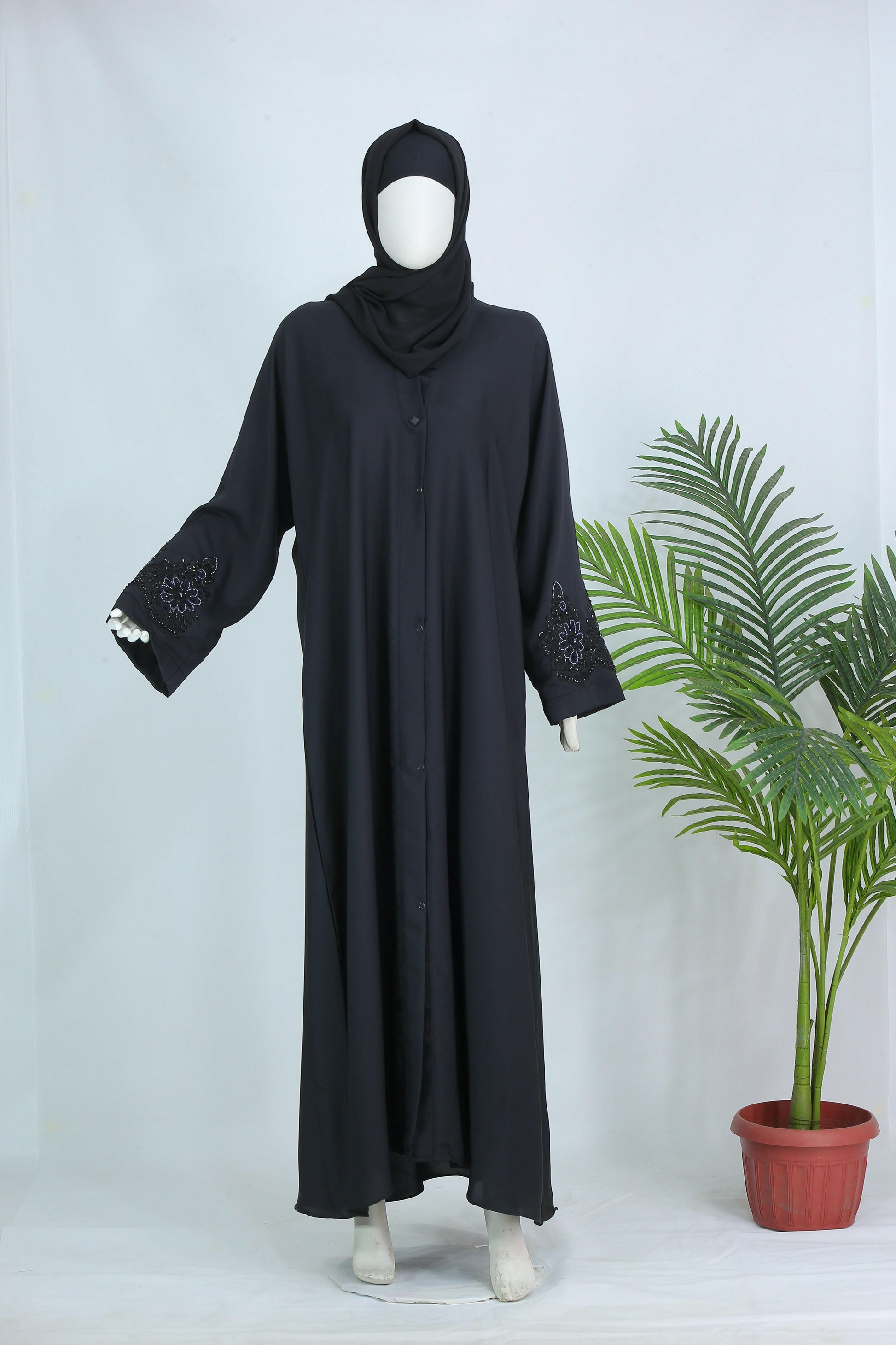Clarity Glam Mahnoor abaya with free scarf in black with embroidered sleeves on mannequin