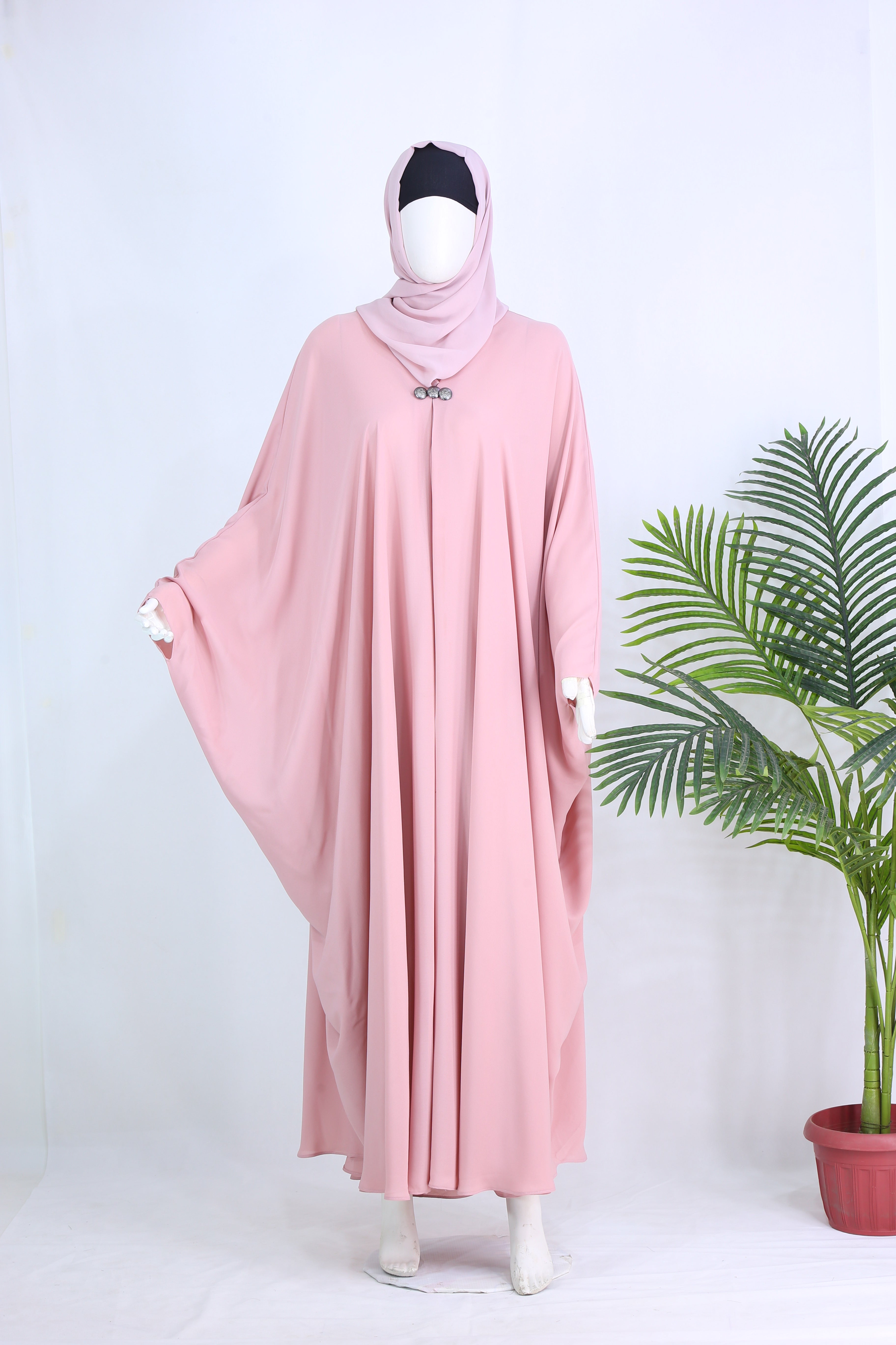 Clarity Glam pink luxury abaya party wear with flowing design and matching hijab on mannequin