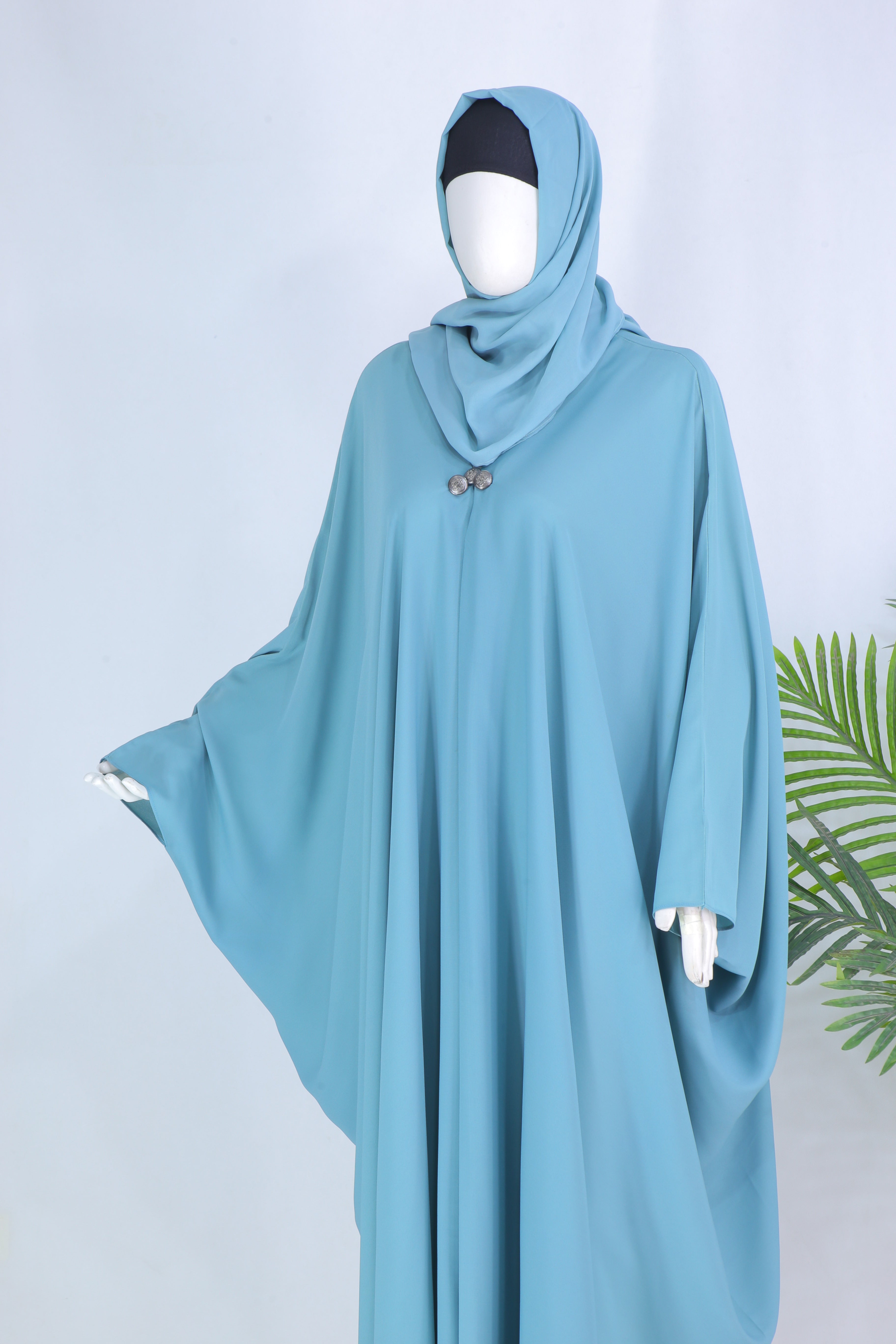 Grace mint abaya in Pakistan by Clarity Glam with flowing fabric and modest design